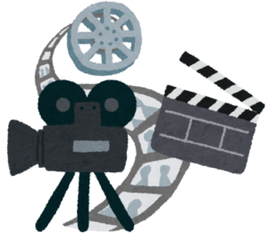 映写機、フィルム、カチンコがセットになった、映画のイメージのイラストです。